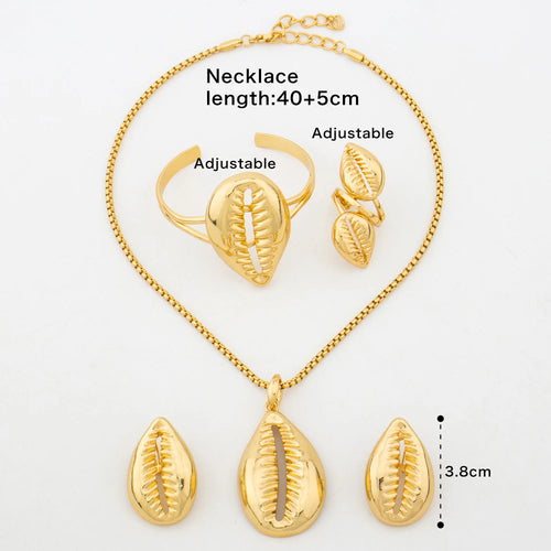 Gold-plated cowrie shell jewelry set with necklace, cuff bracelet and earrings