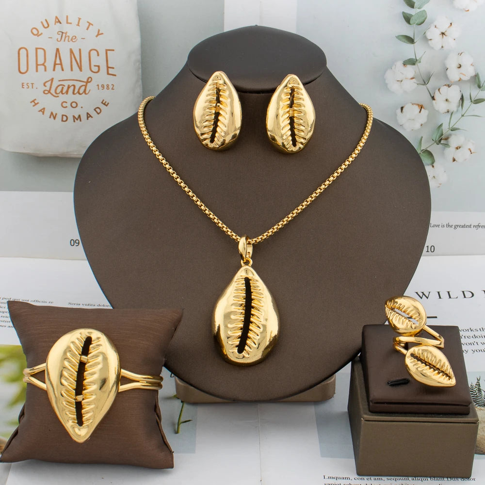 Gold-plated cowrie shell jewelry: necklace, earrings and ring