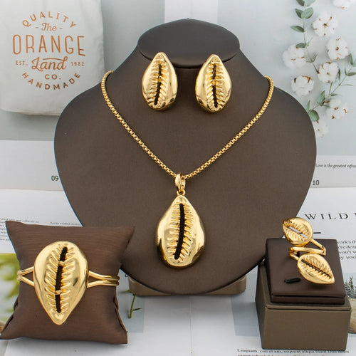 Gold-plated cowrie shell jewelry: necklace, earrings and ring