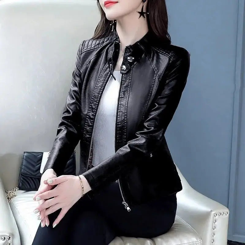 Black faux leather moto jacket with turn-down collar and front zip