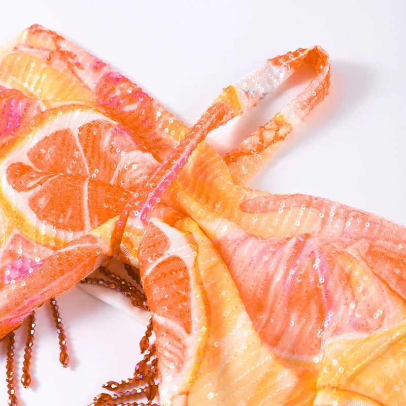 Citrus print halter tie detail with tassels on crop top