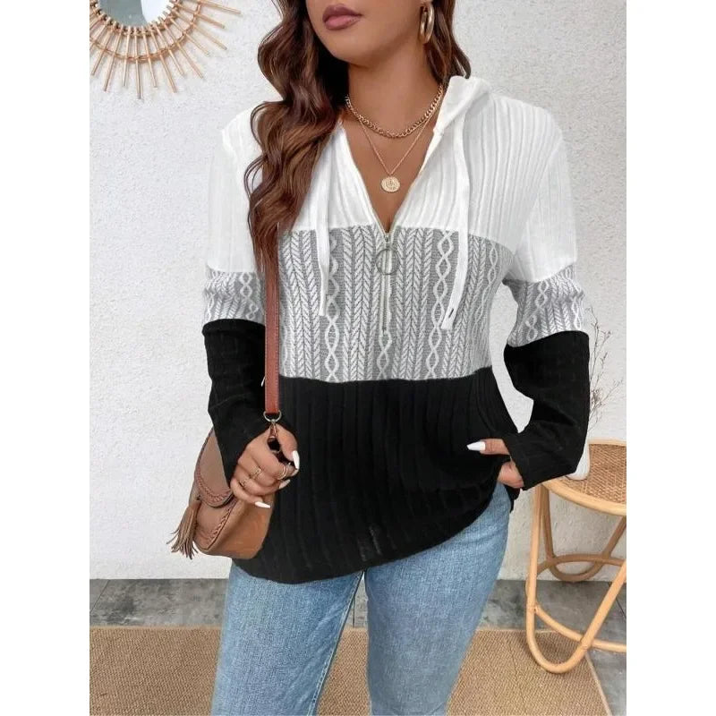 Hooded zip-up top with drawstring, patterned yoke, long sleeves in white and black