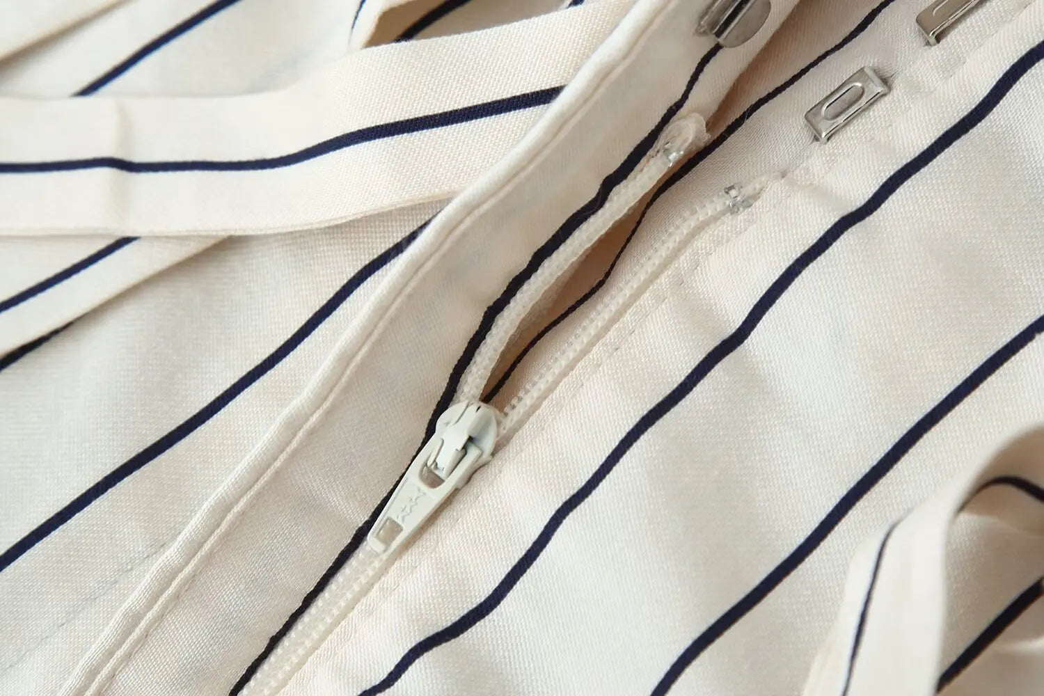 Striped shirt placket and front closure, off-white with navy vertical pinstripes