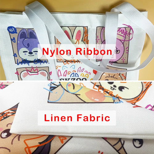 White tote bag with colorful African illustration print and wide fabric handles