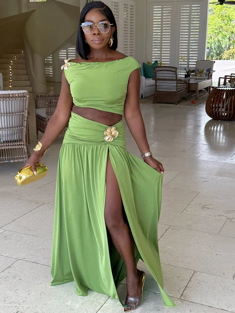 Green off-shoulder cropped top and high-slit maxi skirt set with flower brooch detail