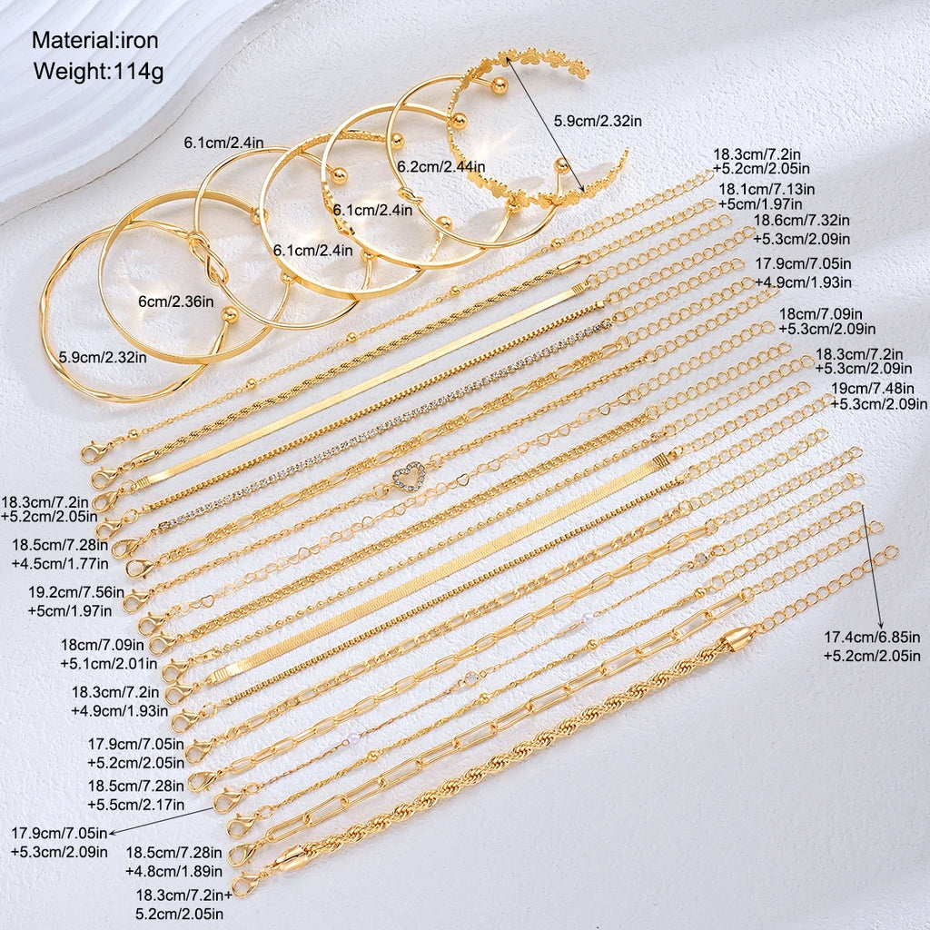 Gold-tone bracelet set with pearl-like beads and small heart charms on chains