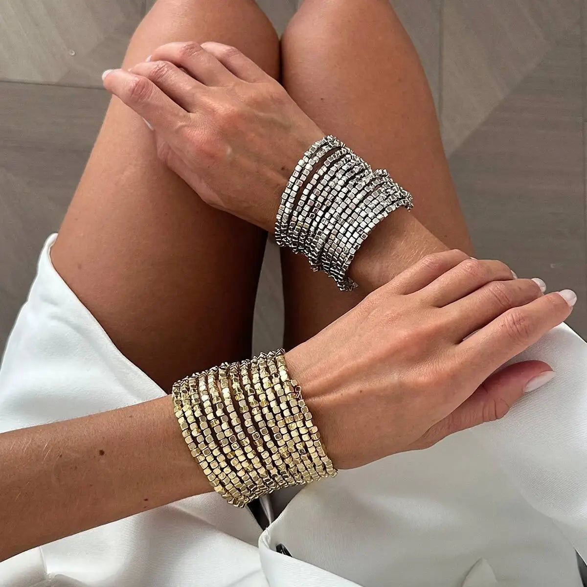 Wide beaded cuff bracelet with silver-tone square beads, multi-layer wrap style.