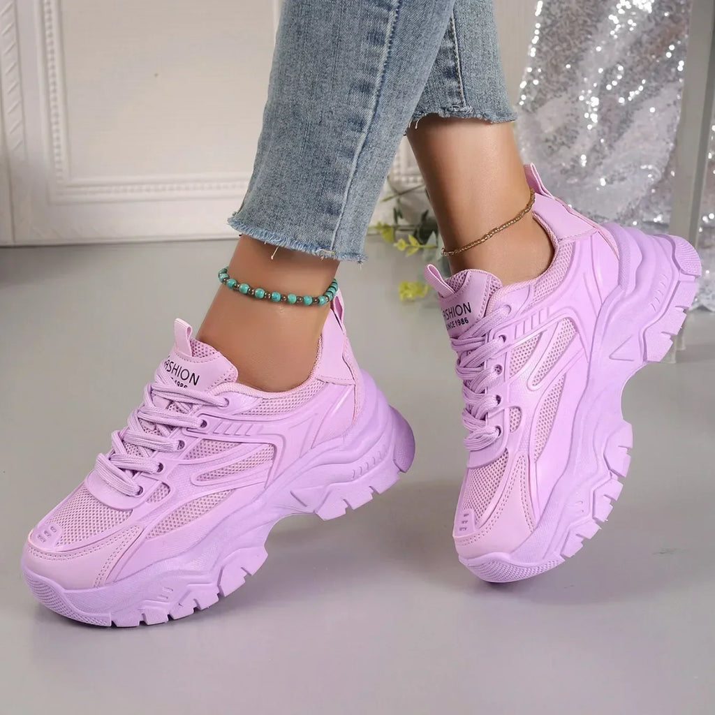 Lavender chunky platform lace-up sneakers with thick sole and side panel detailing