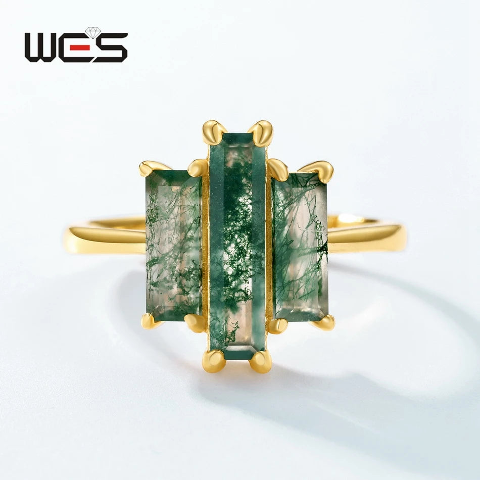 Moss agate three-stone ring, three green rectangular stones with gold prong settings
