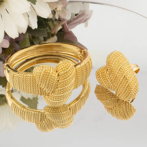 Gold-tone beaded oversized bangle and matching statement ring with textured weave detail