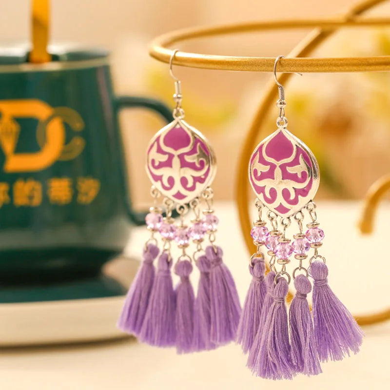 Boho tassel drop earrings with purple teardrop motif, lavender tassels and bead clusters