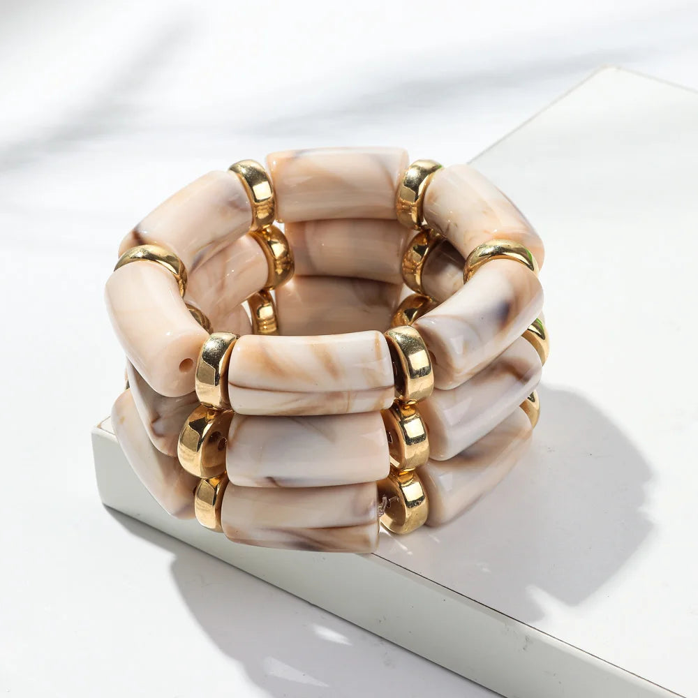 Ivory bamboo tube bead bracelet set with gold-tone rings, chunky stretch 3-pack