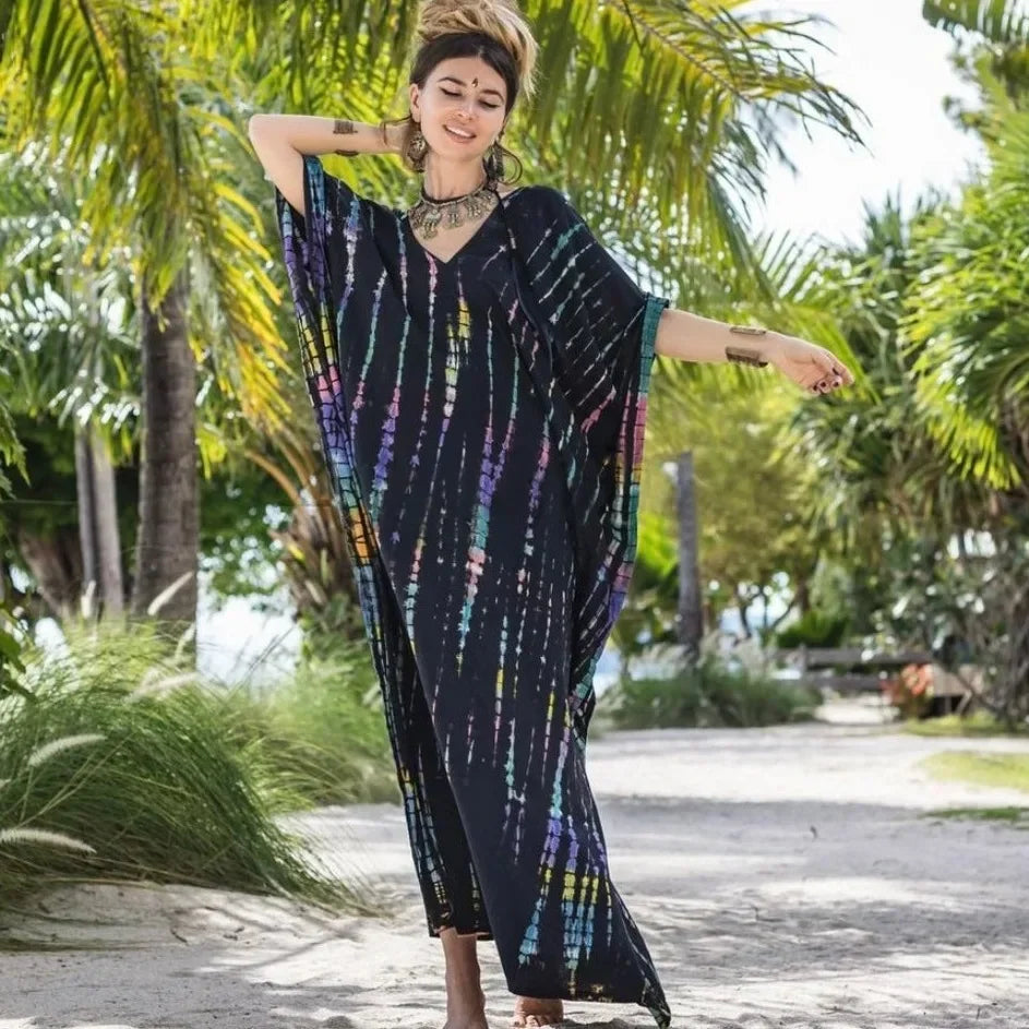 Maxi kaftan dress, black with colorful vertical tie-dye stripes, V-neck poncho sleeves