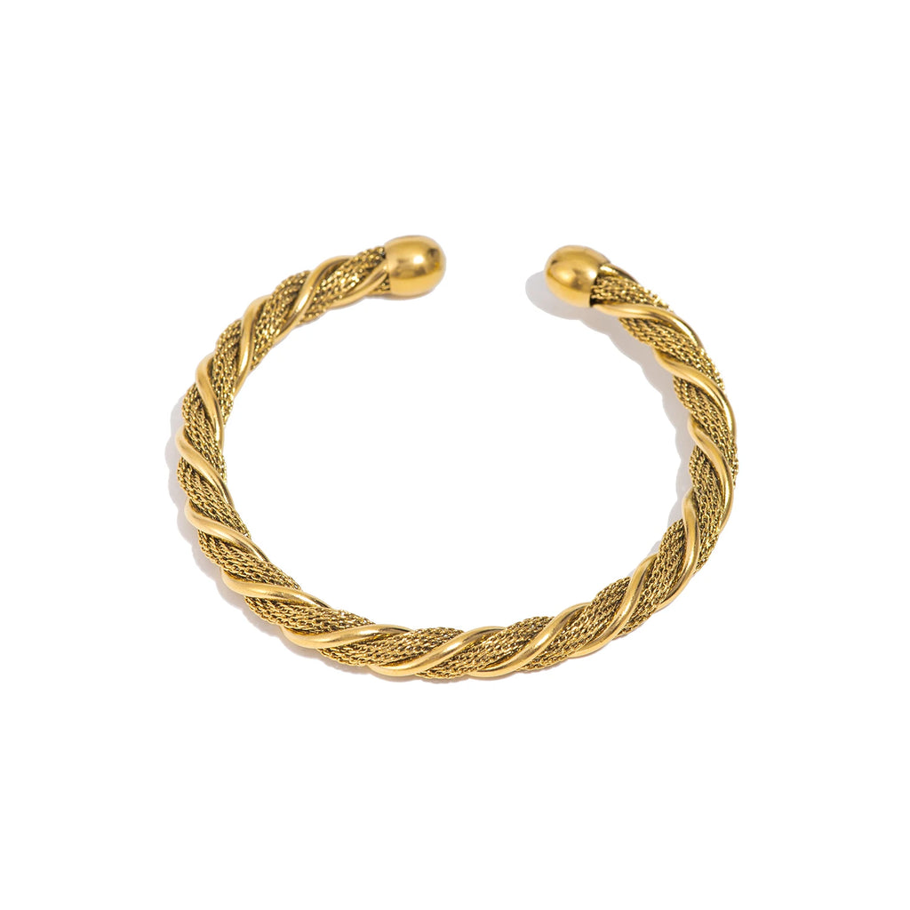 Gold-tone woven open bangle bracelet with twisted braid texture and flat clasp ends