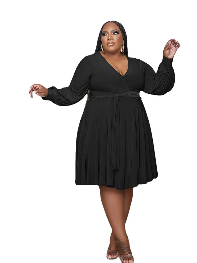 Black plus size V-neck long-sleeve dress with gathered pleats and belt tie