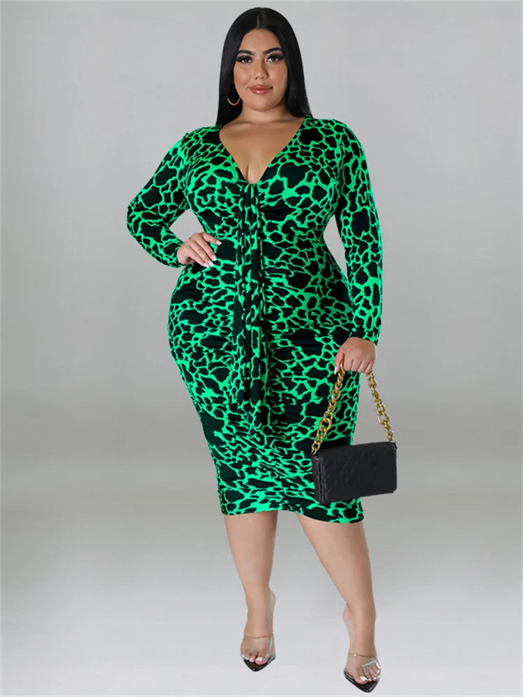 Plus size V-neck bodycon dress, long sleeves, green leopard print with front tie detail