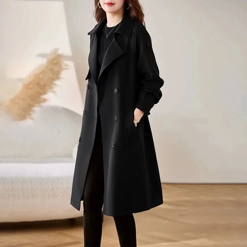 Women’s black double-breasted trench coat with notched lapels and front buttons