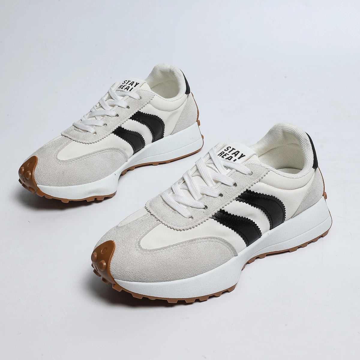 Women's lace-up sneakers, white with black side stripes and gum rubber outsole