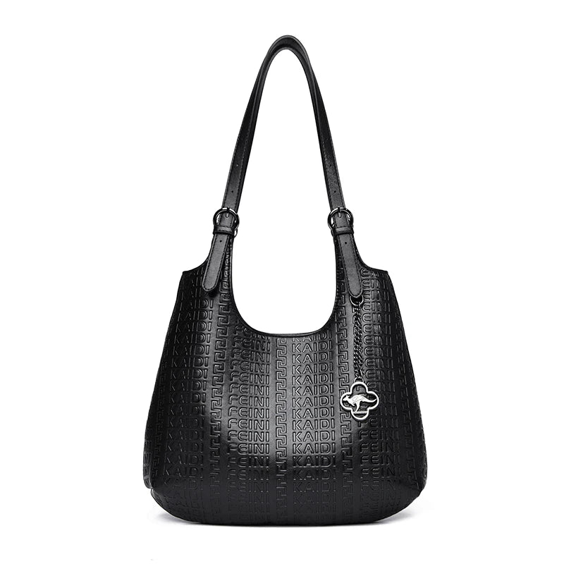 Black embossed leather shoulder tote with top handles and flower logo charm