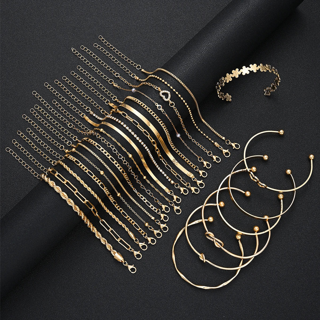 Gold-tone heart pearl zircon charm bracelet set with multiple chain and cuff bangles