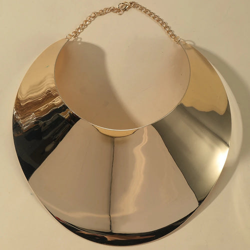 Gold-toned sculpted collar choker necklace with chain strap and wide open collar shape.