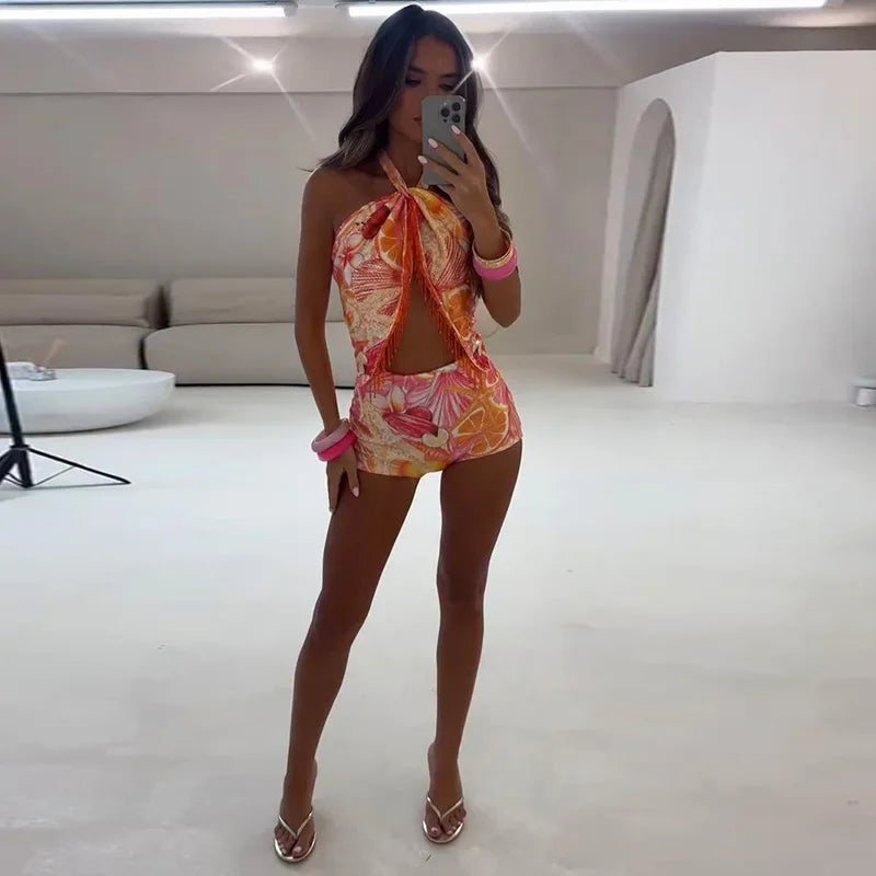 Halter crop top and shorts set with orange pink fruit print and halter bow at neck