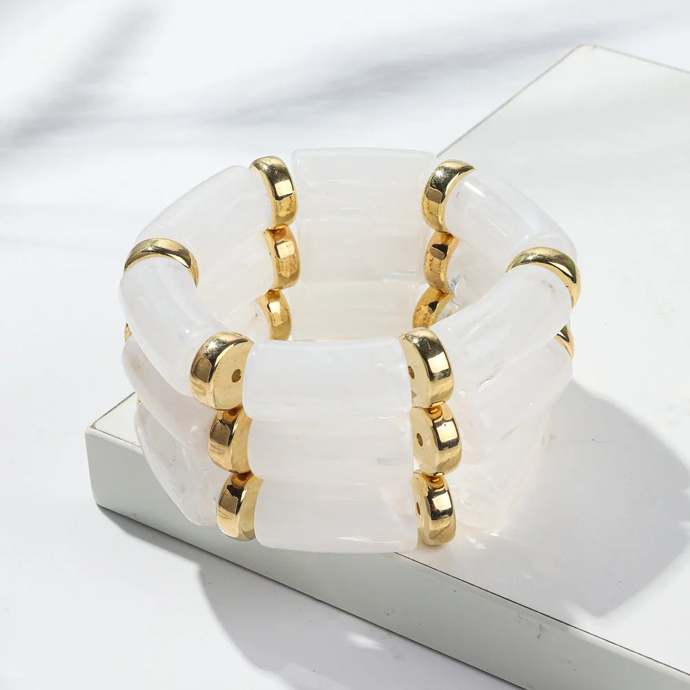 White tube bead bracelet set with gold-tone accents
