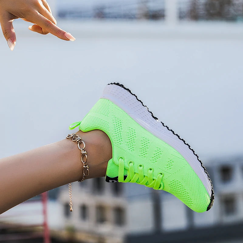 Neon green lace-up mesh platform sneakers with white sole and textured sidewall