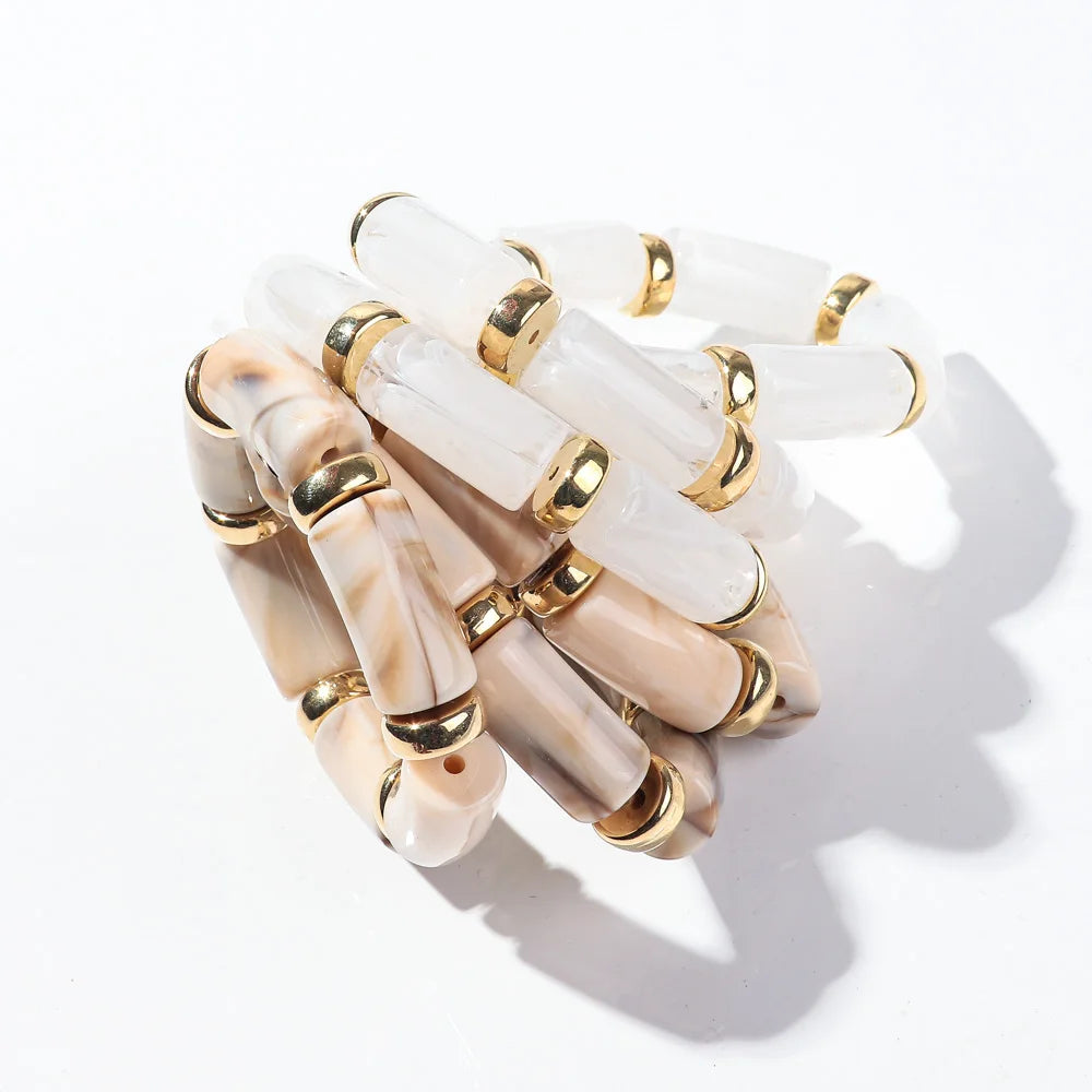 Bamboo tube bead bracelet set with ivory/clear tubes and gold-tone link bezels