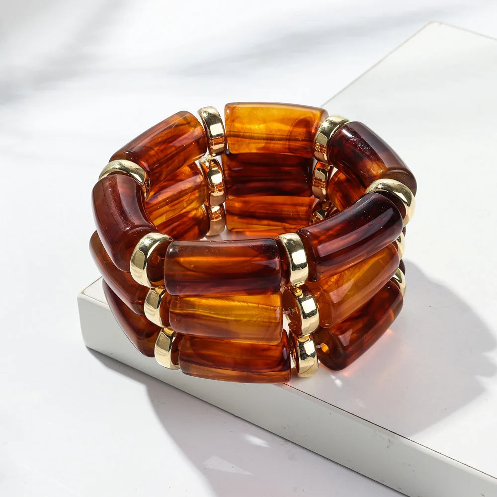 Amber bamboo tube bead bracelet set with gold-tone rings, chunky stretch 3-pack