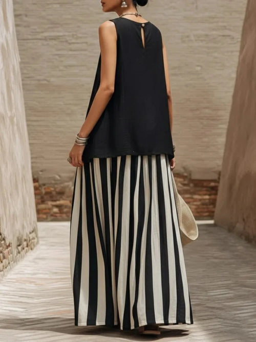 Black sleeveless tank top with keyhole neckline and high-waist striped maxi skirt set
