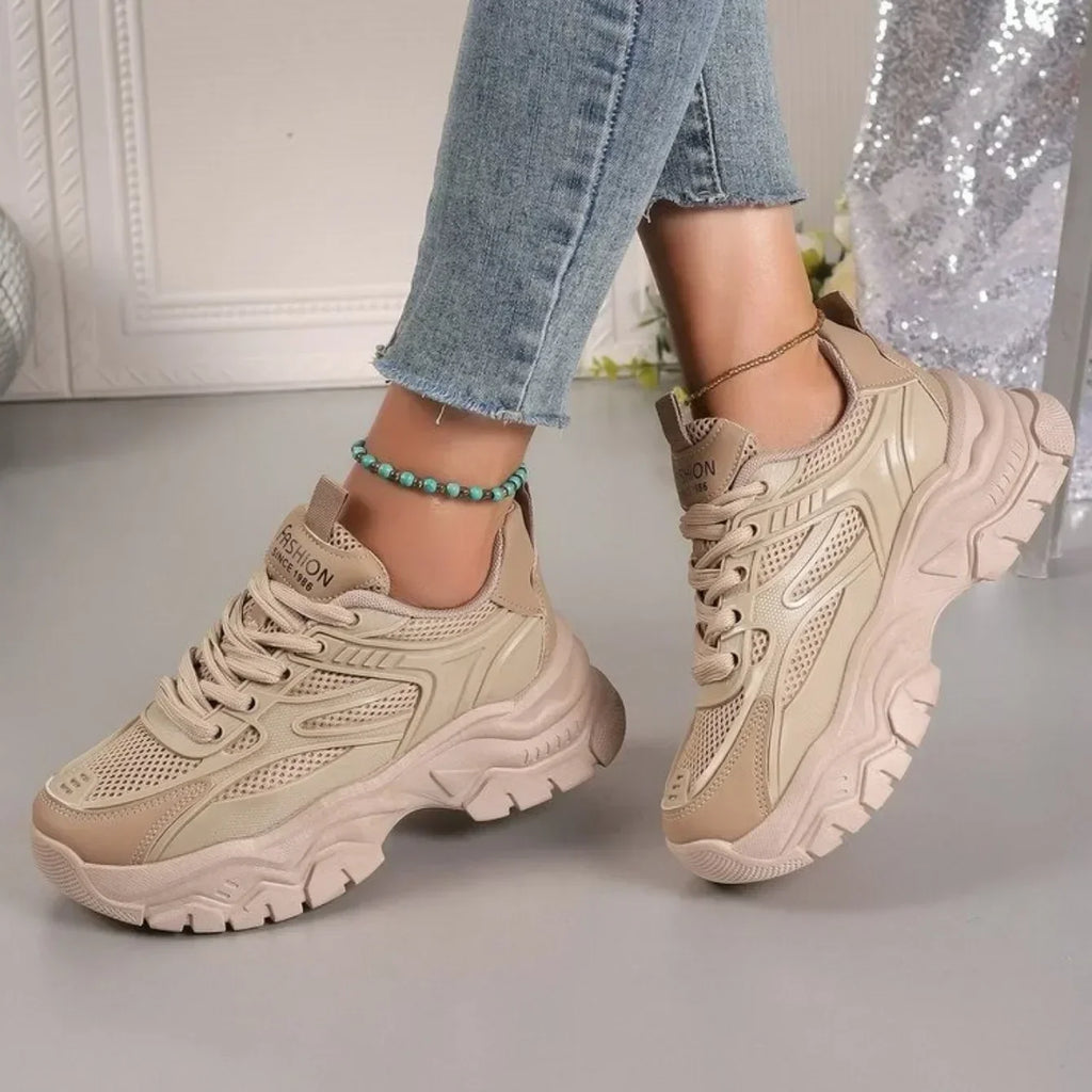 Beige chunky platform lace-up sneakers with lace-up front and cushioned chunky sole