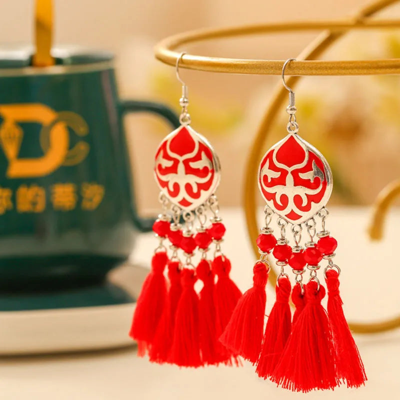 Boho tassel drop earrings with red enamel teardrop charm and red tassels