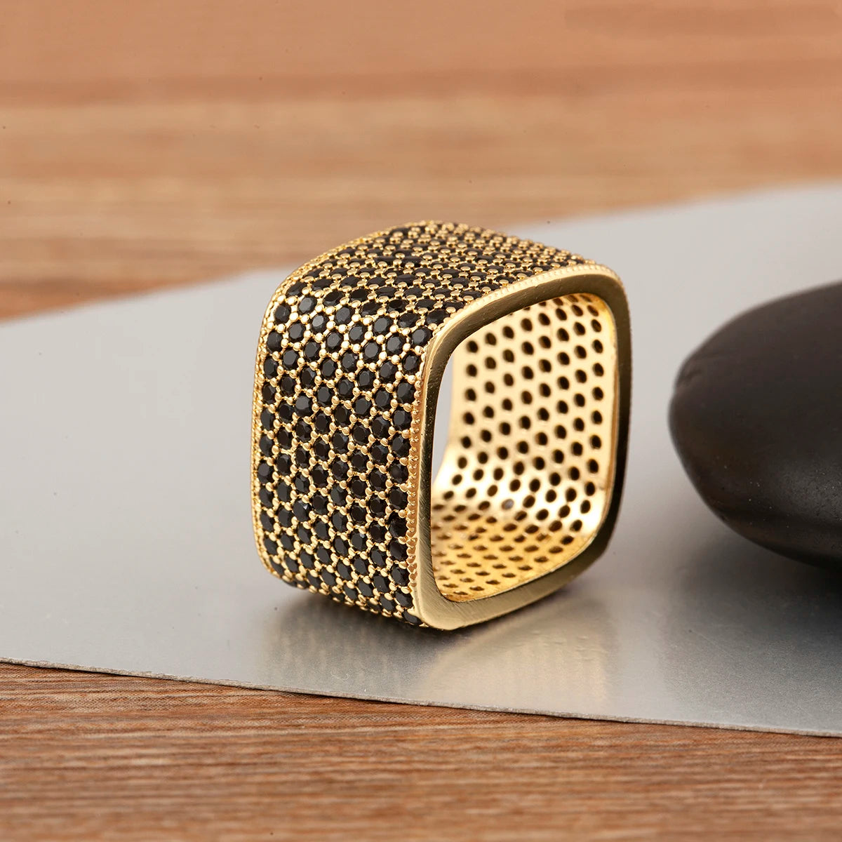 Square open adjustable rhinestone ring with dark blue stones and gold-tone interior