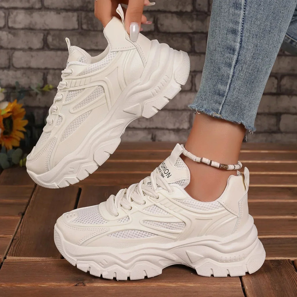 White chunky platform lace-up sneakers with lace-up front and chunky sidewall