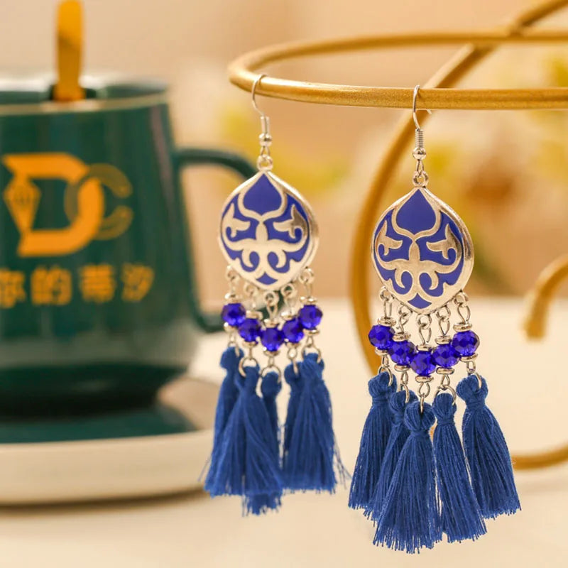 Boho tassel drop earrings with deep blue enamel teardrop charm and blue tassels