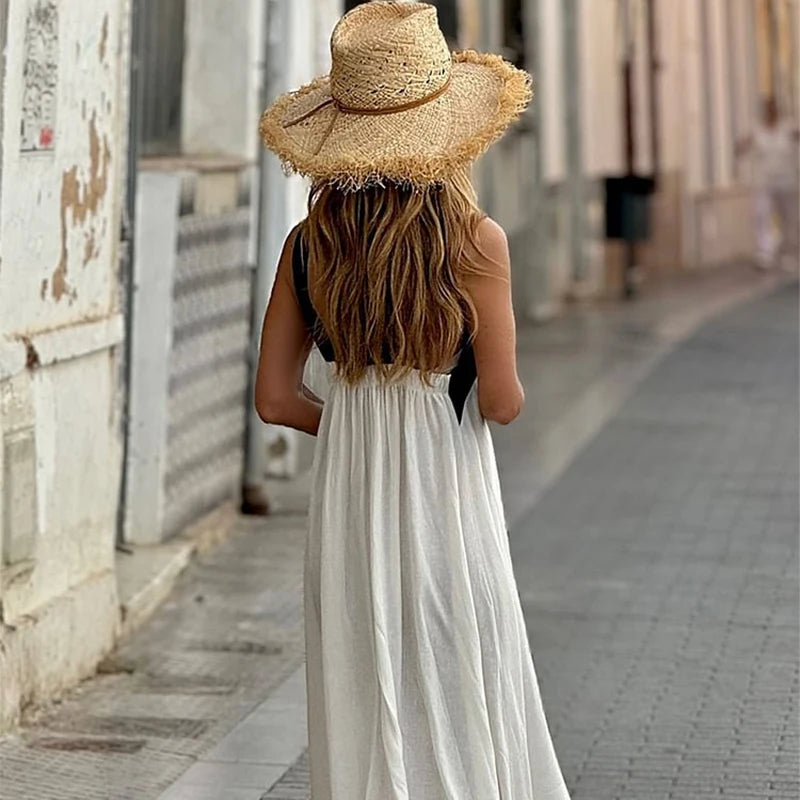 White halter neck linen maxi dress, sleeveless back view with halter straps