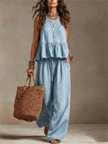 Light blue tiered ruffle sleeveless top with matching wide-leg trousers
