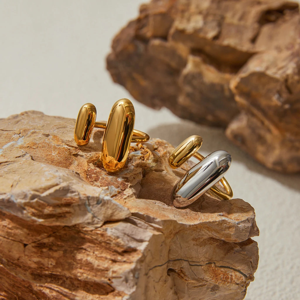 Geometric oval open rings in gold and silver tones, oval open-front design