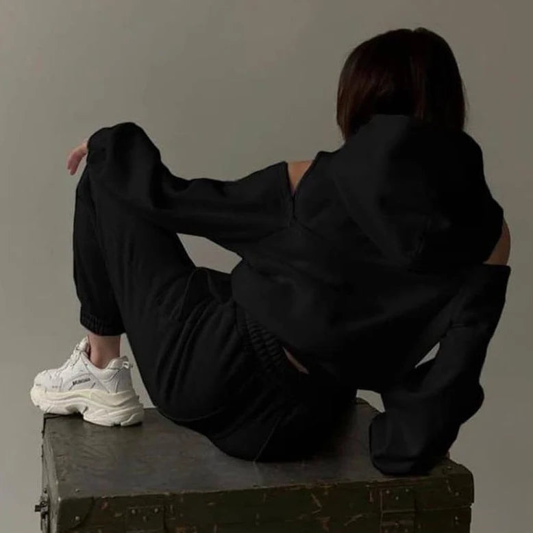 Black hooded crop hoodie with matching jogger pants, elastic cuffs and drawstring hood