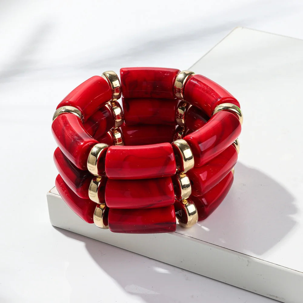 Deep red bamboo tube bead bracelet set with gold-tone rings, chunky stretch 3-pack