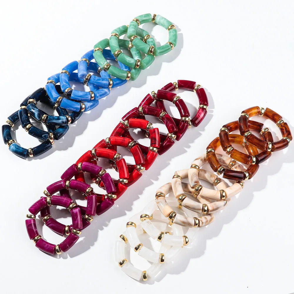 Bamboo tube bead bracelet set with teal green, blue, red, purple, and cream tubes