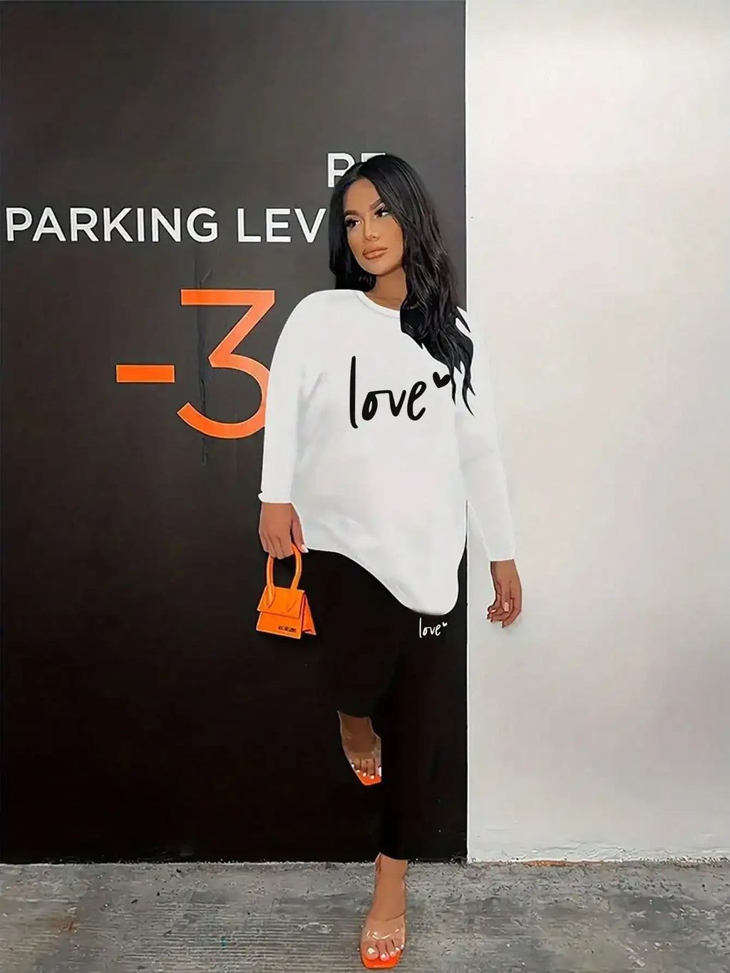 White love-letter long-sleeve top and tight-leg elastic-waist pants set, round neck