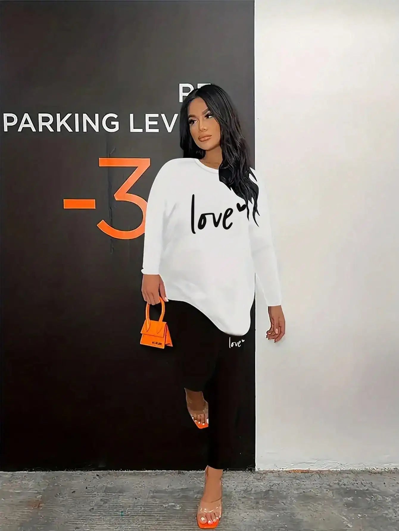 White love-letter long-sleeve top and tight-leg elastic-waist pants set, round neck