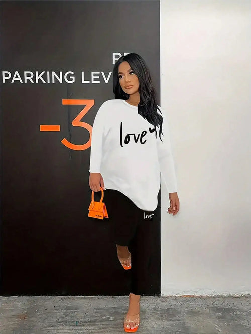 White love-letter long-sleeve top and tight-leg elastic-waist pants set, round neck