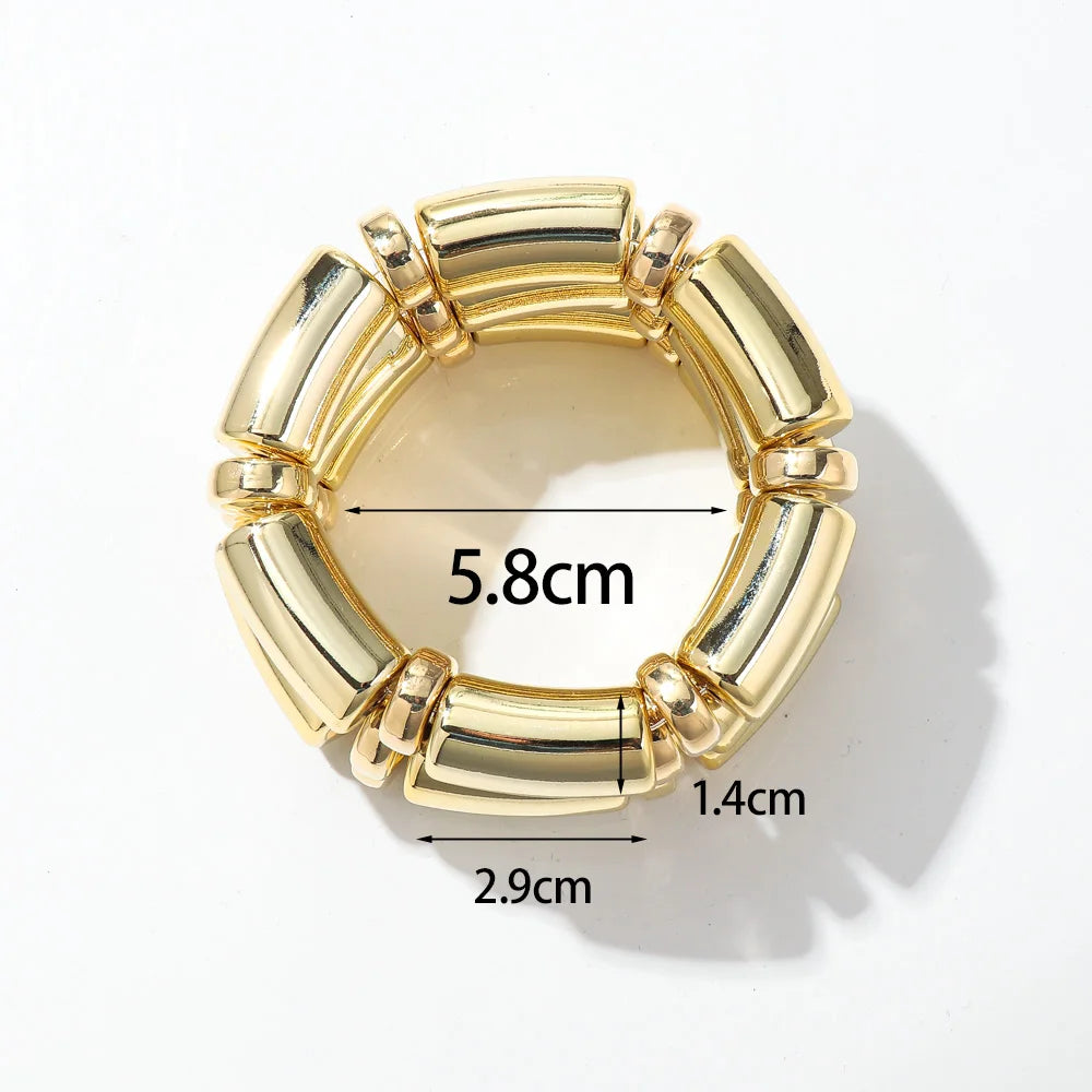 Gold-tone bamboo tube bead bracelet with segmented open cuff, about 5.8 cm wide