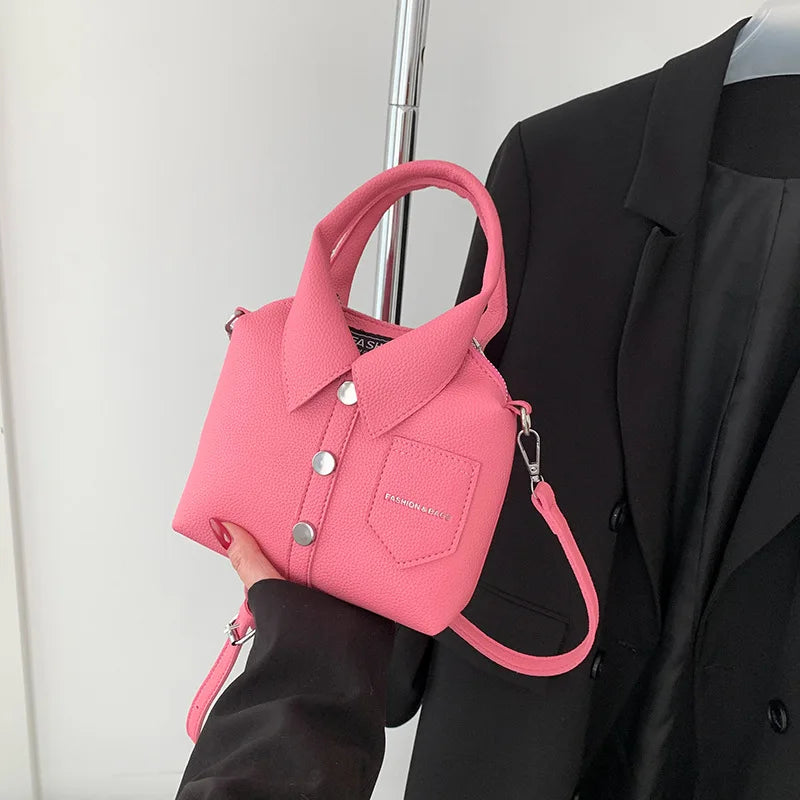 Pink square PU leather crossbody bag with top handle, chain strap, front snap pocket