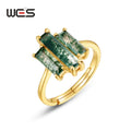 Moss agate three-stone ring with green rectangular stones and gold-plated setting