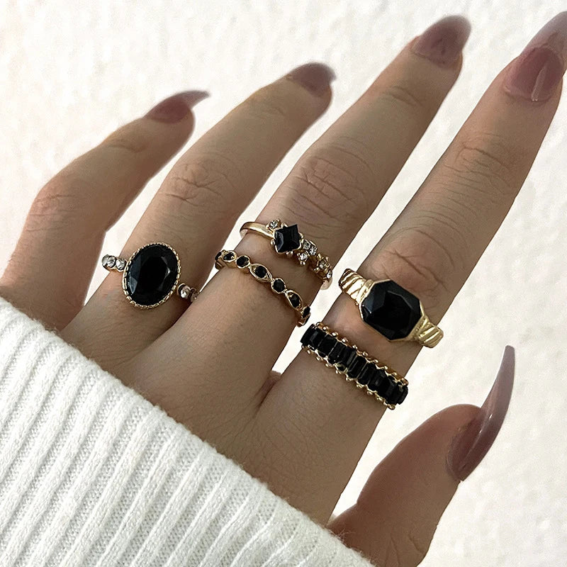 5-piece rhinestone ring set, gold with black oval and baguette crystal stones on hand