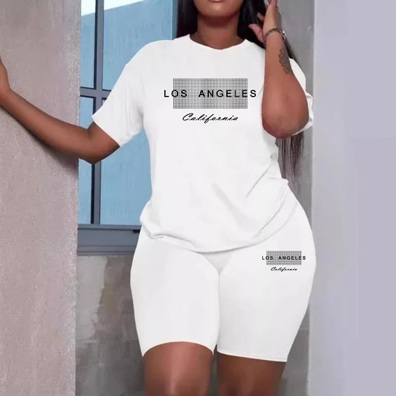 White women's matching tee and shorts set with 'Los Angeles' graphic.